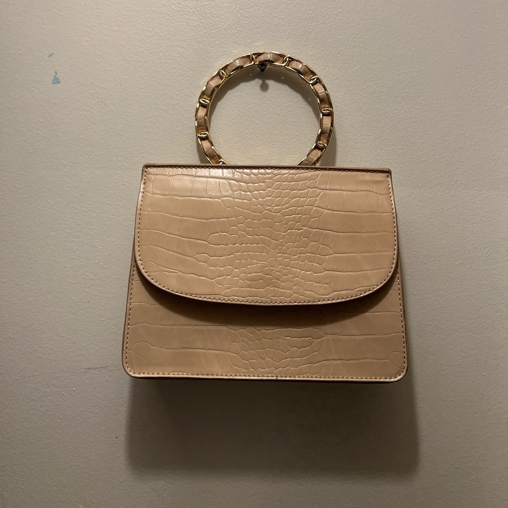 Beige clutch